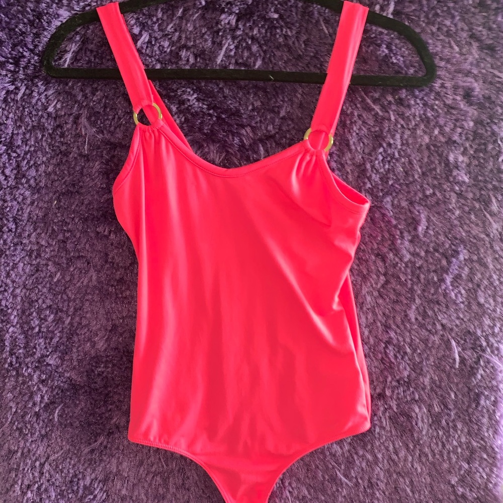 Hot pink body suit
